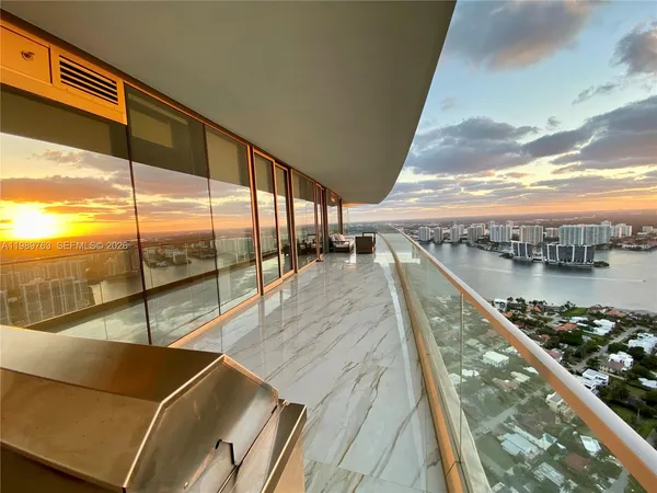 a view of a balcony with city
