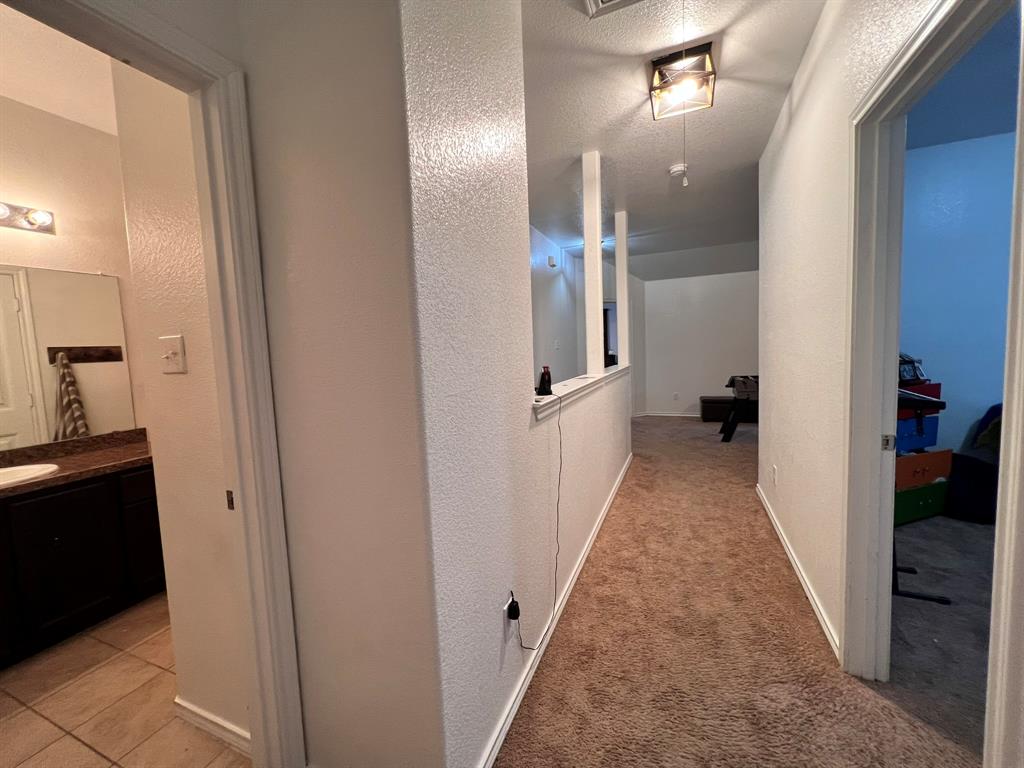 324 Fairgrounds Lane Ponder, TX 76259 - Photo 34 of 40 a view of hallway with wooden floor