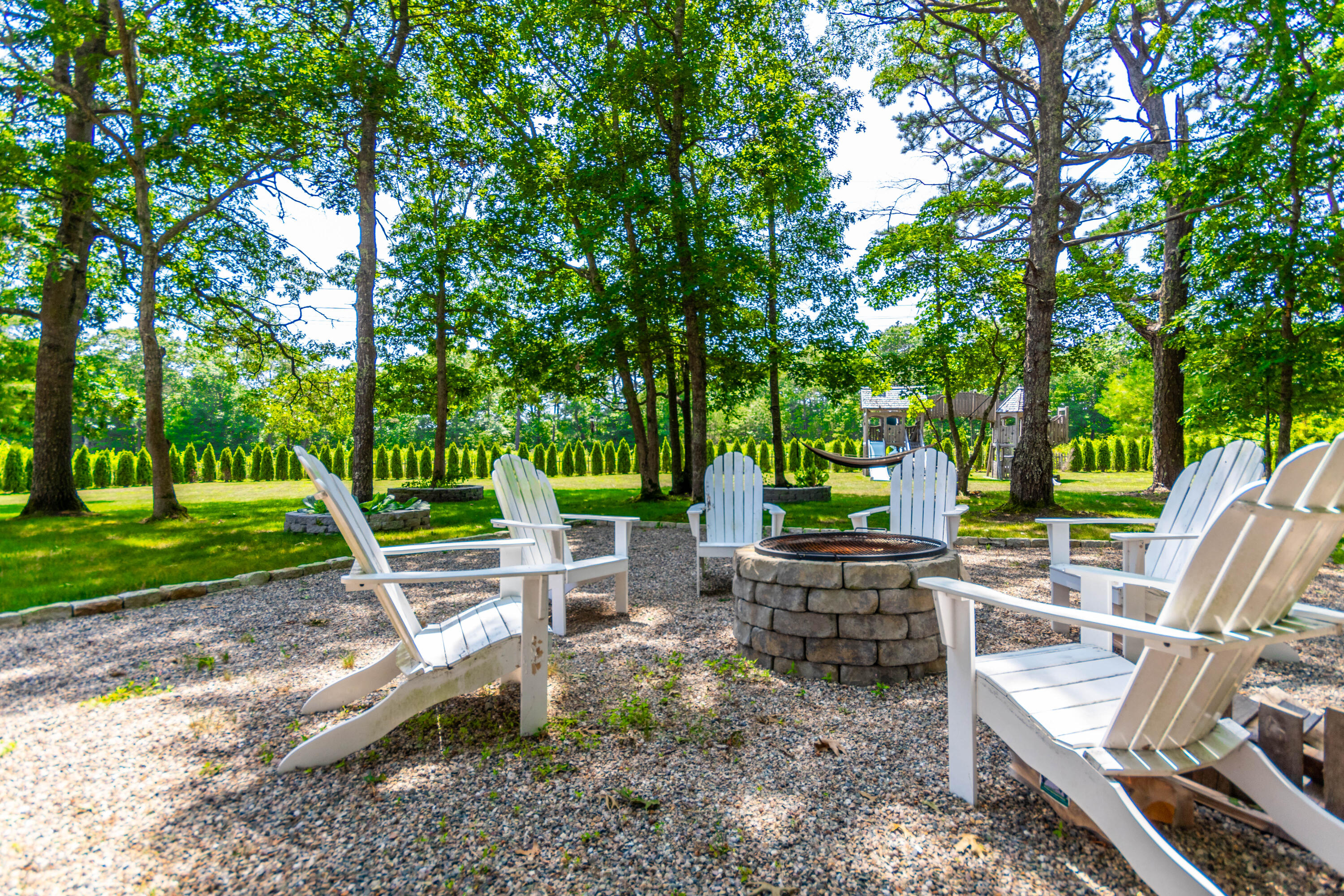 43 Yearling Run Road Buzzards Bay, MA 02532 - Photo 30 of 37 a view of a table and chairs in the garden