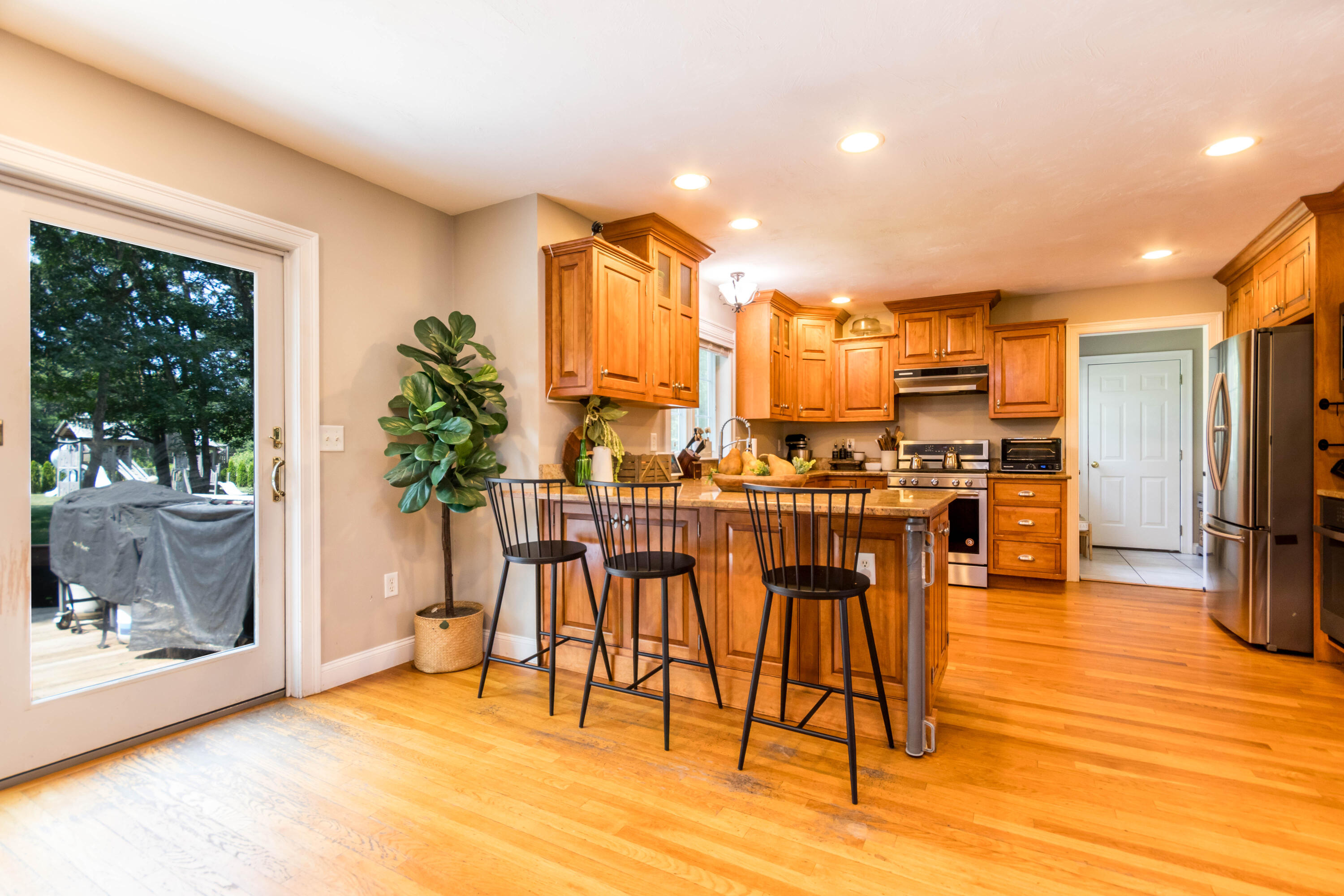 43 Yearling Run Road Buzzards Bay, MA 02532 - Photo 4 of 37 a view of a kitchen with furniture and a potted plant
