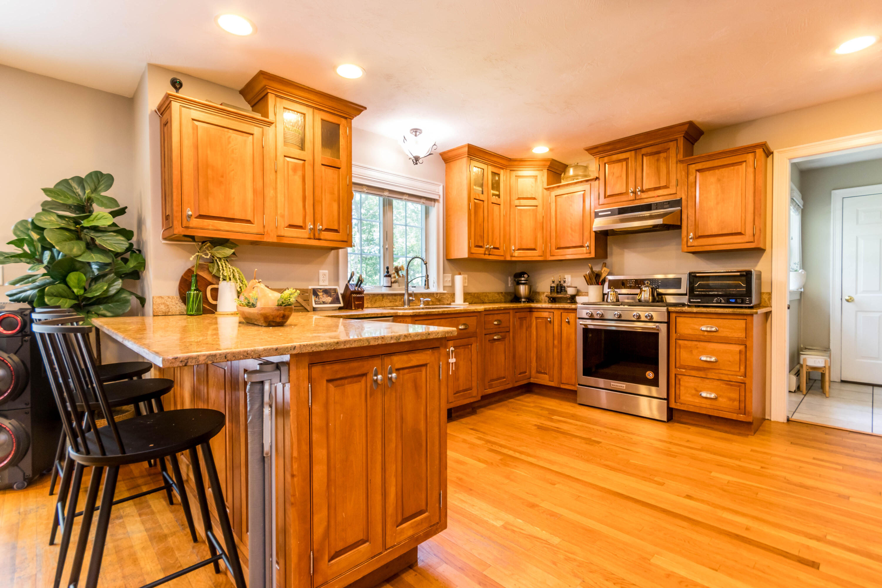43 Yearling Run Road Buzzards Bay, MA 02532 - Photo 6 of 37 a kitchen with stainless steel appliances granite countertop a sink and cabinets
