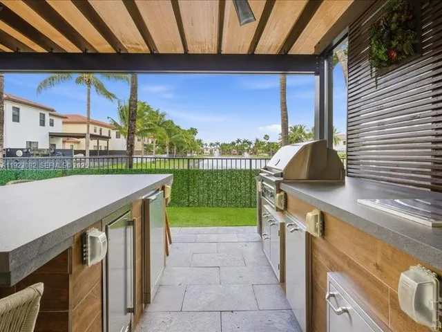 a view of swimming pool with a patio