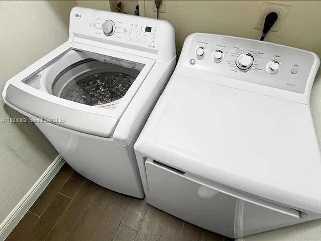 a close up view of washer and dryer with washer