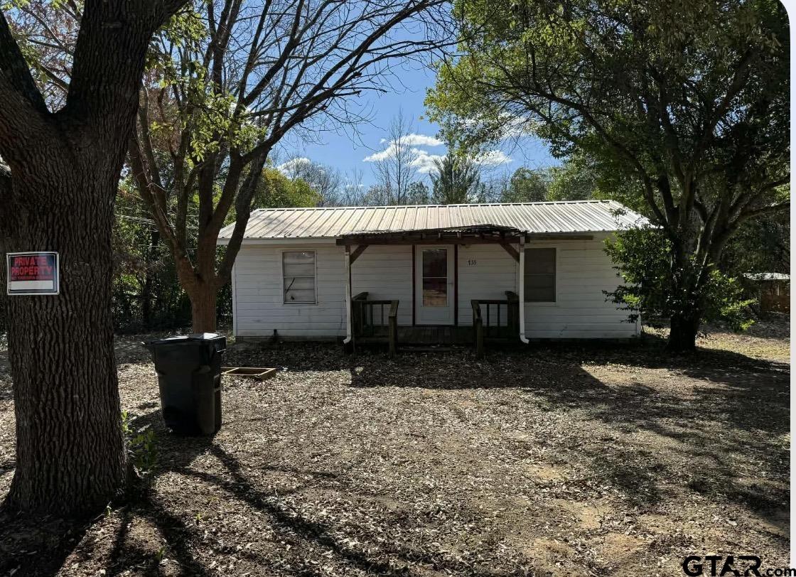 733 Mallory Street Lindale, TX 75771 - Photo 1 of 8 a front view of a house with a yard