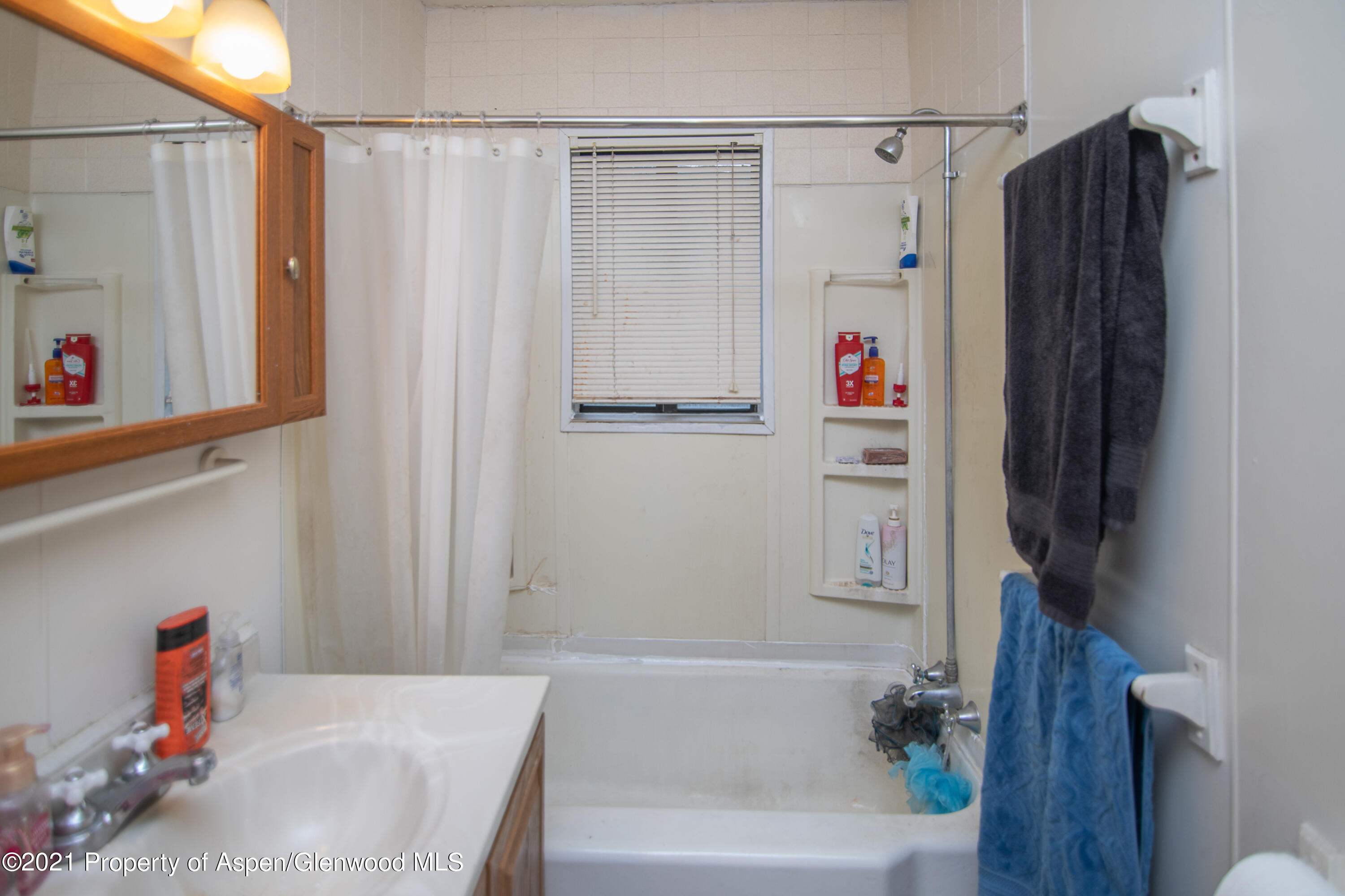 761 Rose Street Craig, CO 81625 - Photo 21 of 42 a bathroom with a shower and a bathtub
