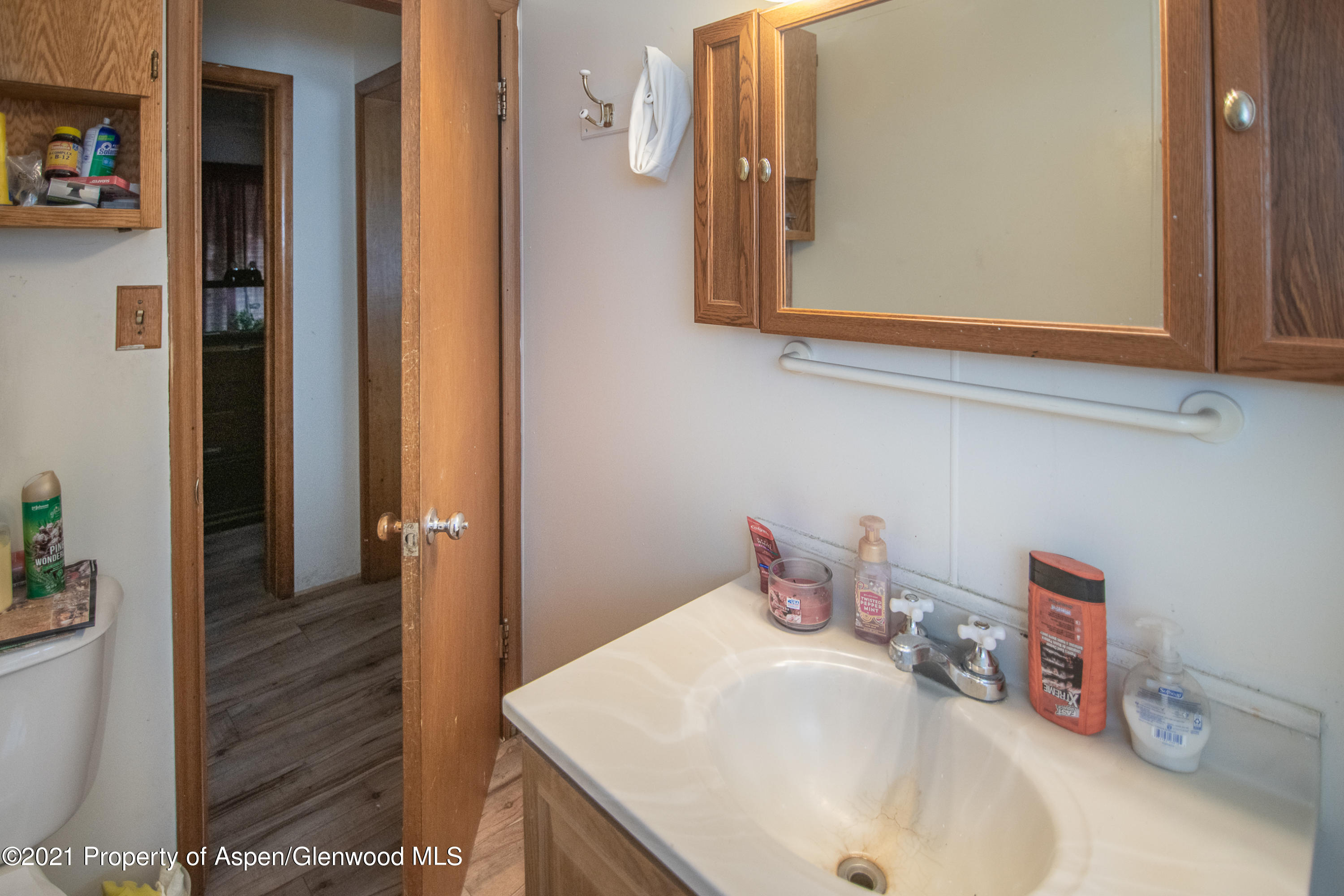 761 Rose Street Craig, CO 81625 - Photo 23 of 42 a bathroom with a sink and a mirror