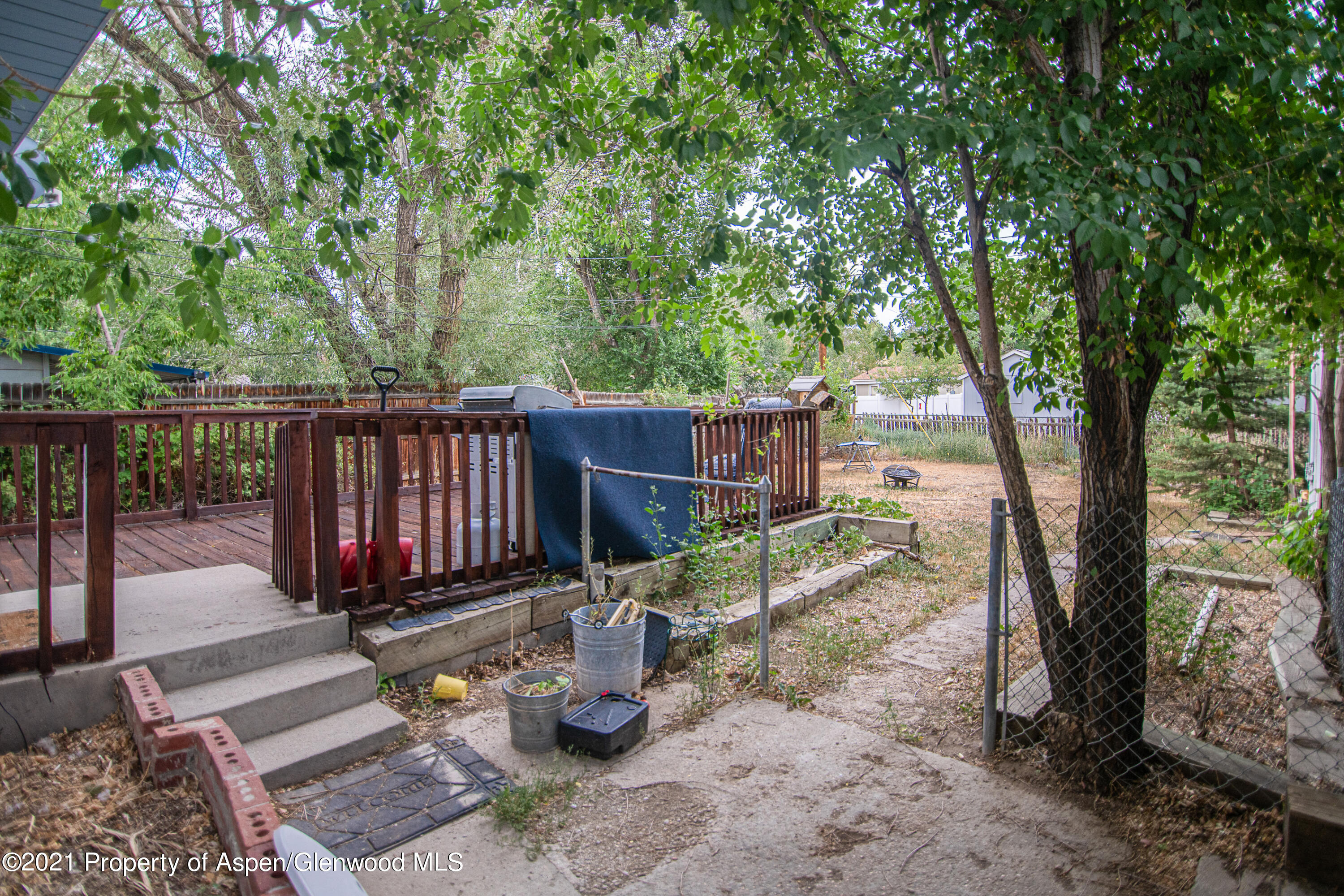 761 Rose Street Craig, CO 81625 - Photo 4 of 42 a view of a deck with a backyard