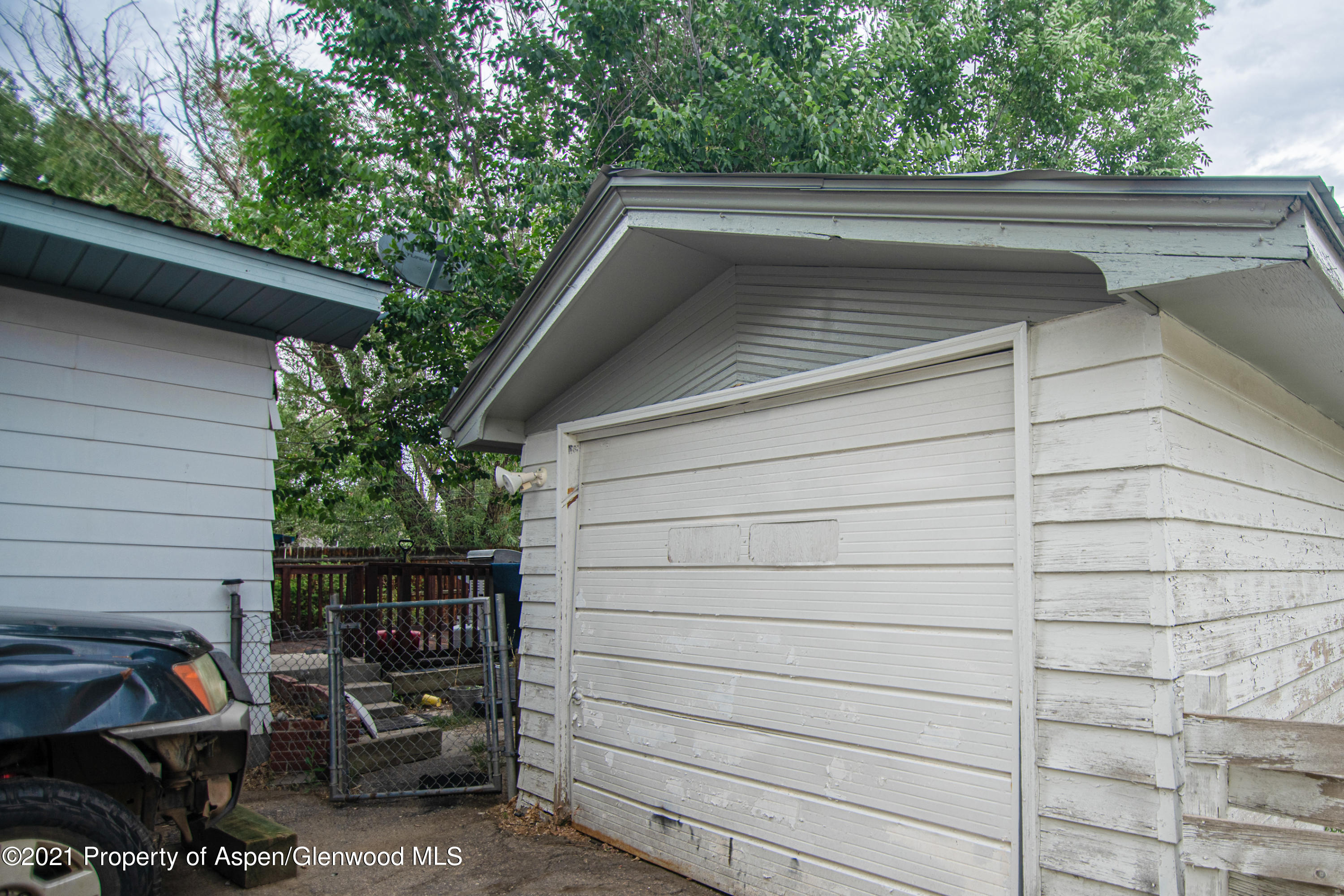 761 Rose Street Craig, CO 81625 - Photo 8 of 42 a backyard view of a house