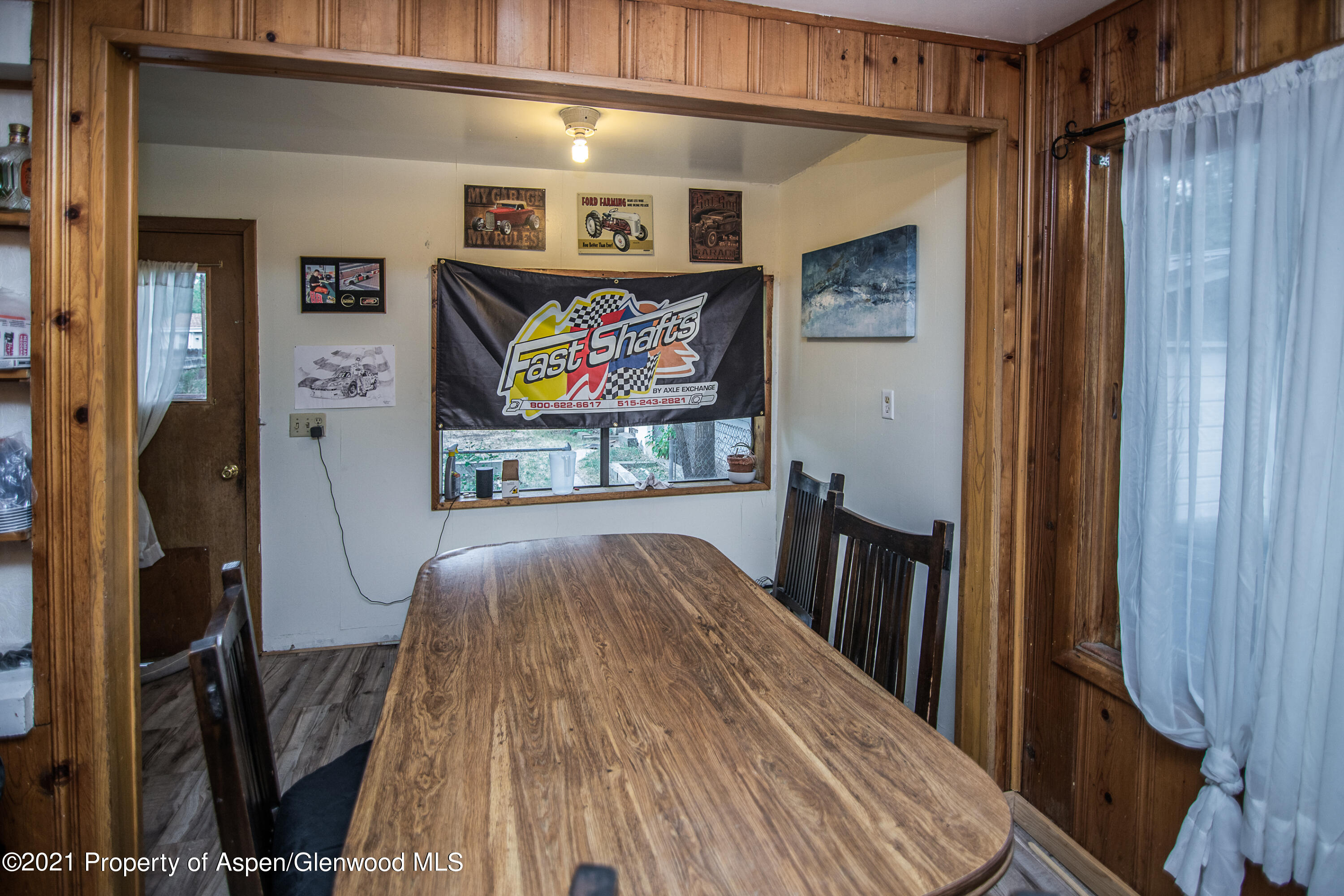 761 Rose Street Craig, CO 81625 - Photo 10 of 42 a living room with furniture and a flat screen tv