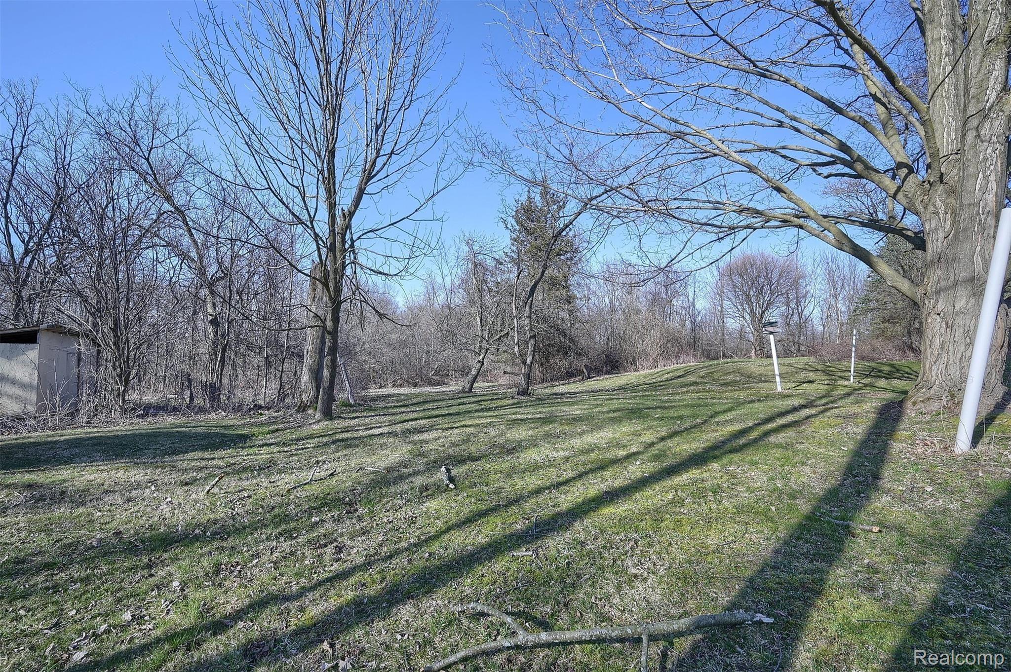54400 9 Mile Road South Lyon, MI 48178 - Photo 36 of 37 37-Backyard-2nd-View.jpg