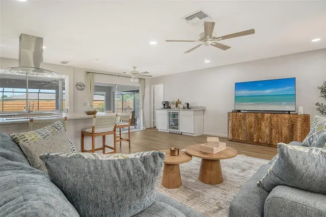 a living room with furniture and a rug