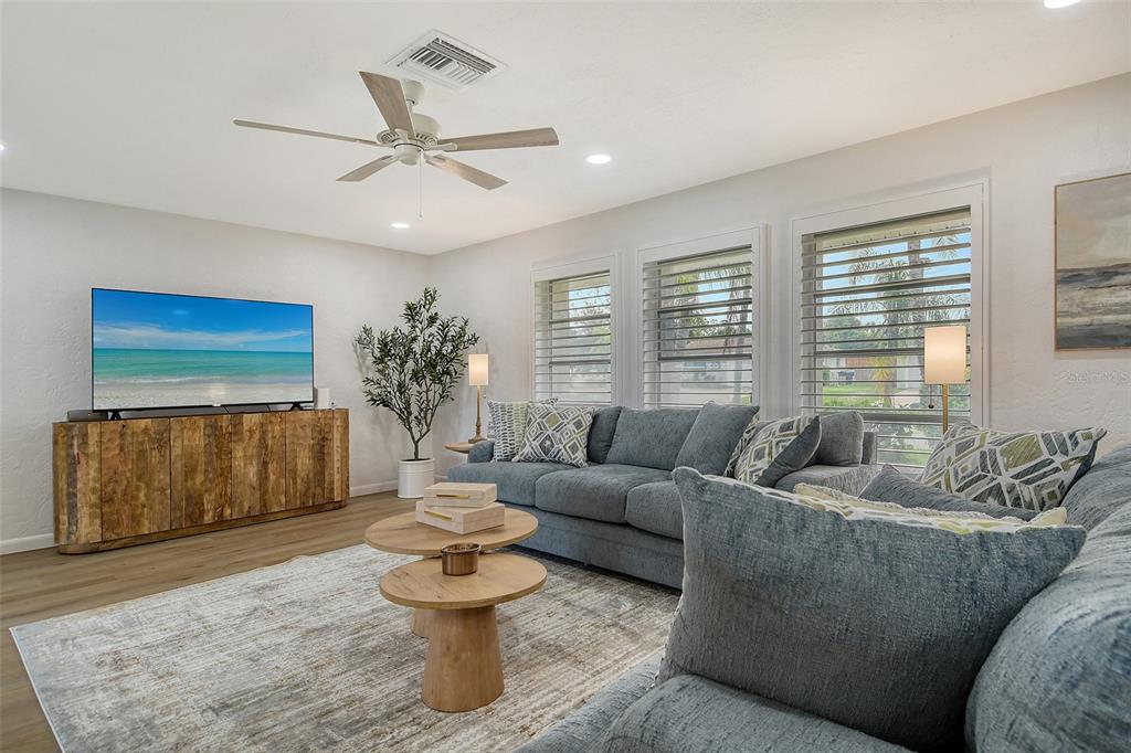 6722 Roxbury Drive Sarasota, FL 34231 - Photo 12 of 87 a living room with furniture and a large window