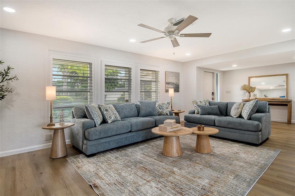 6722 Roxbury Drive Sarasota, FL 34231 - Photo 13 of 87 a living room with furniture and a large window
