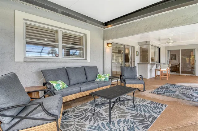 a kitchen with a stove refrigerator and sink