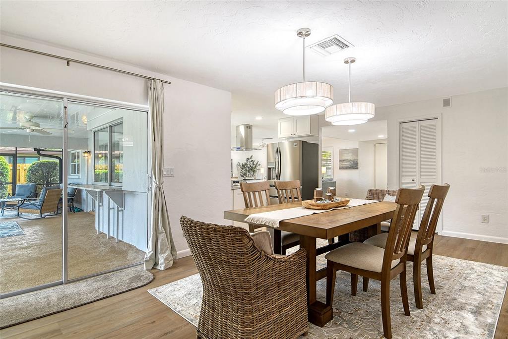 6722 Roxbury Drive Sarasota, FL 34231 - Photo 33 of 87 a view of a dining room with furniture
