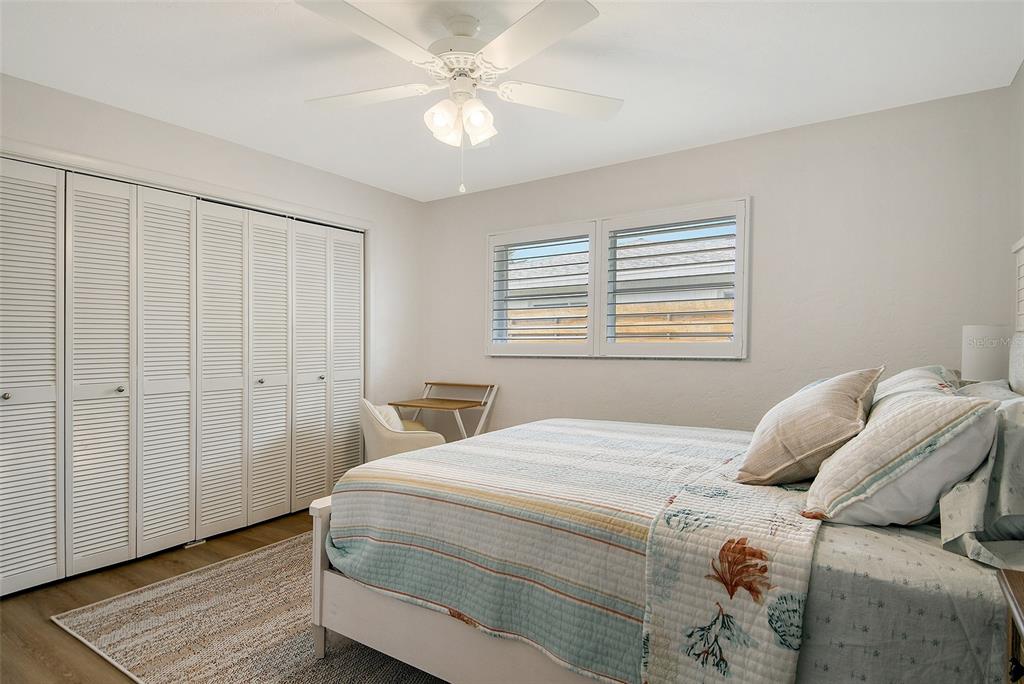 6722 Roxbury Drive Sarasota, FL 34231 - Photo 39 of 87 a bedroom with a bed and a window