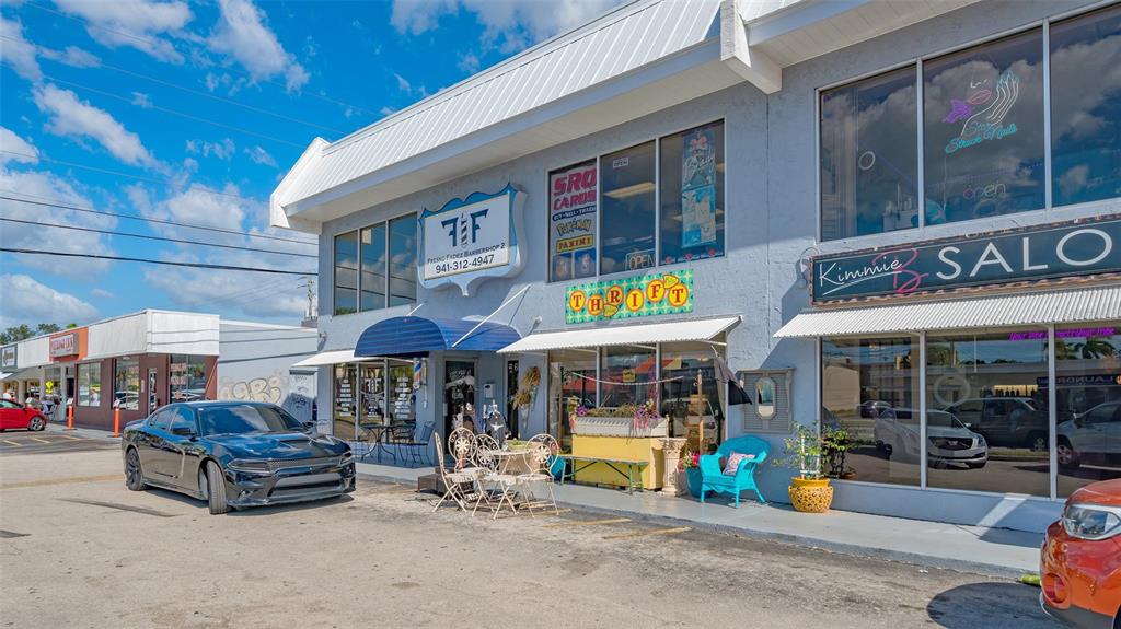 6722 Roxbury Drive Sarasota, FL 34231 - Photo 63 of 87 a car parked in front of a store