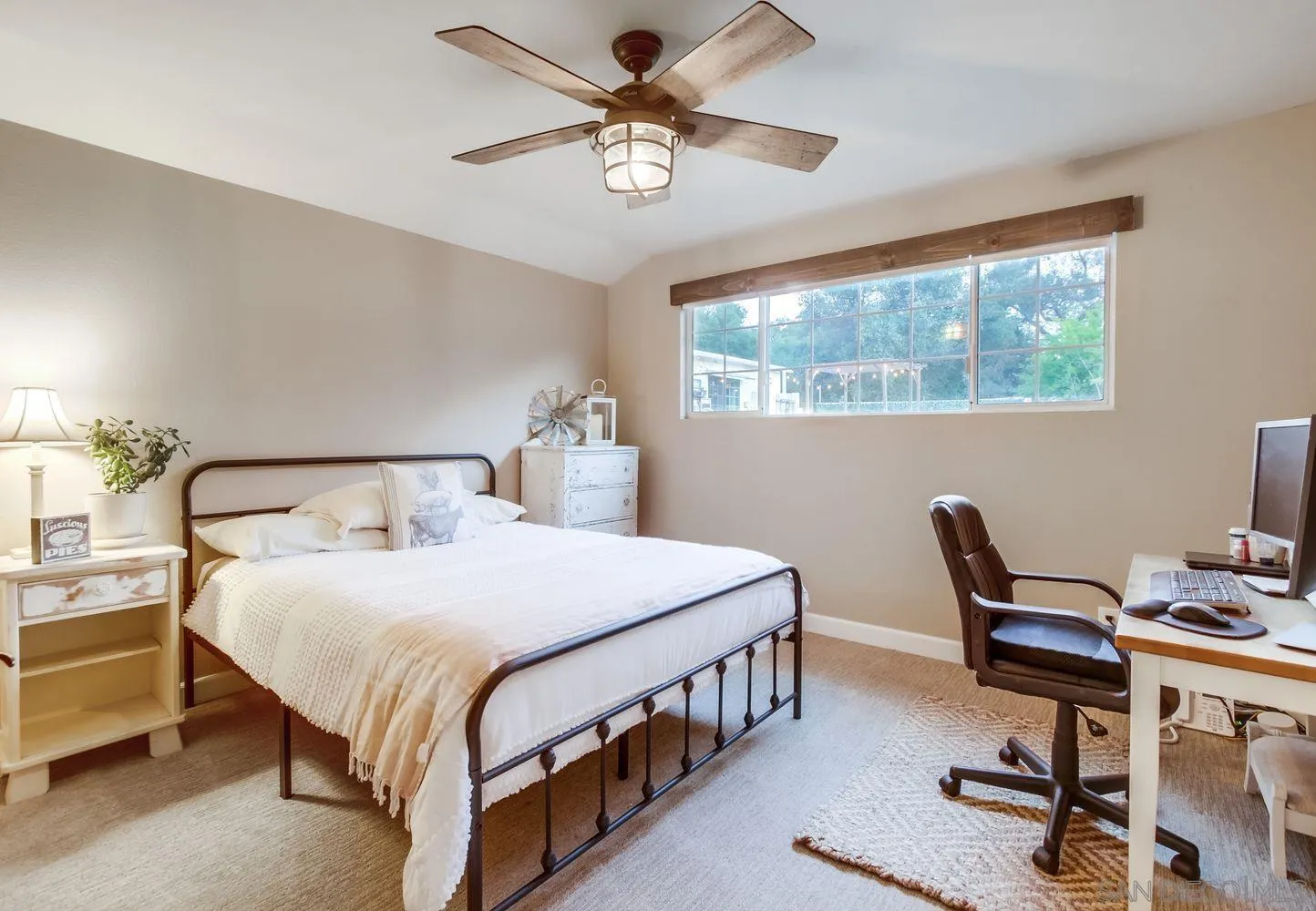 17048 Handlebar Road Ramona, CA 92065 - Photo 22 of 75 a bedroom with a bed a desk and chair