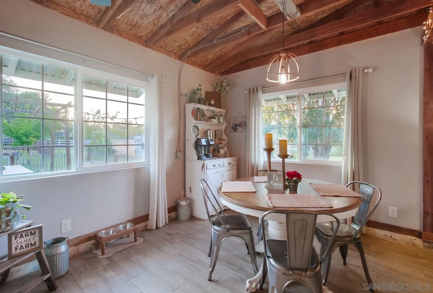 17048 Handlebar Road Ramona, CA 92065 - Photo 52 of 75 a view of a dining room with furniture window and outside view