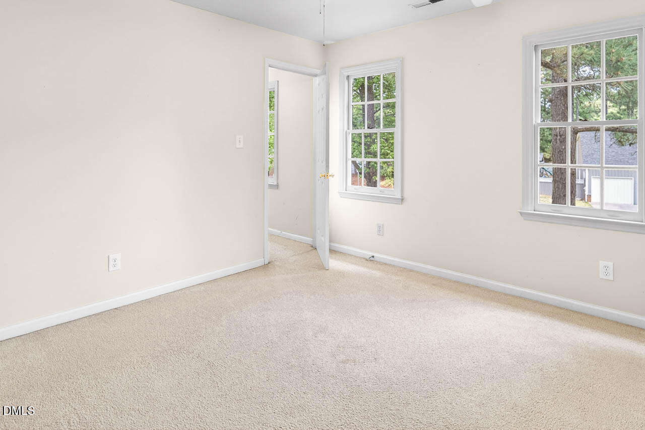 2209 Lodestar Drive Raleigh, NC 27615 - Photo 36 of 50 an empty room with a window
