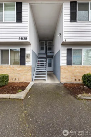 a view of a cars parked in front of a house