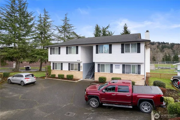 a car parked in front of a house