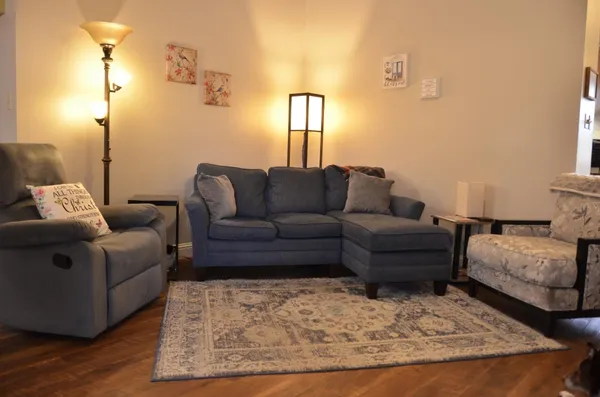 a living room with furniture and a couch