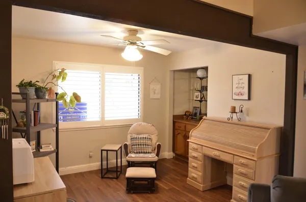 a living room with furniture and a window