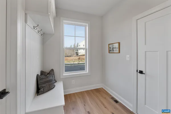 a bedroom with a bed and a view of bathroom