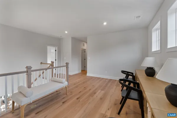 a bedroom with double bed and a window