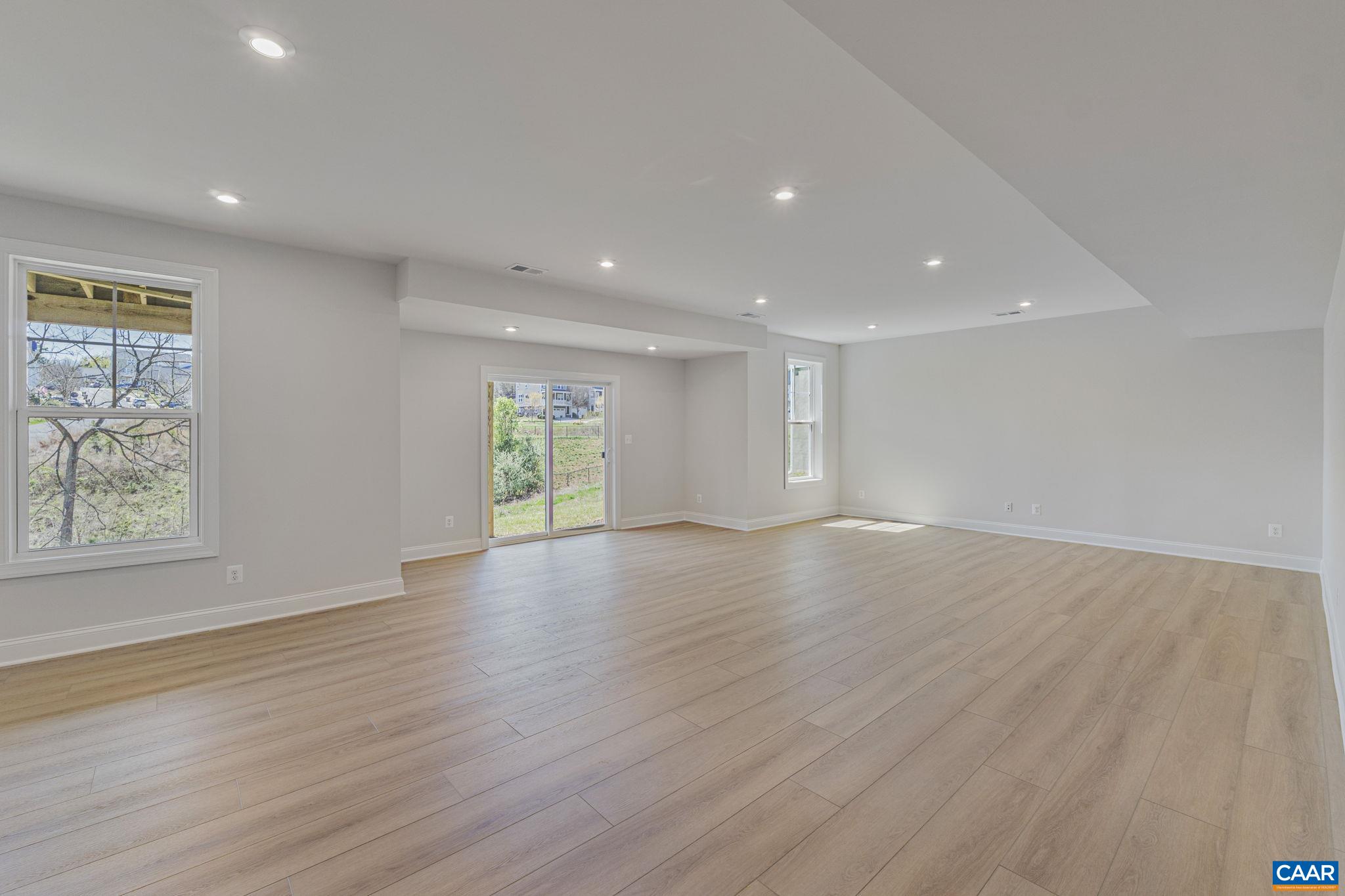 35 Mary Jackson Court Charlottesville, VA 22902 - Photo 45 of 56 an empty room with wooden floor and windows