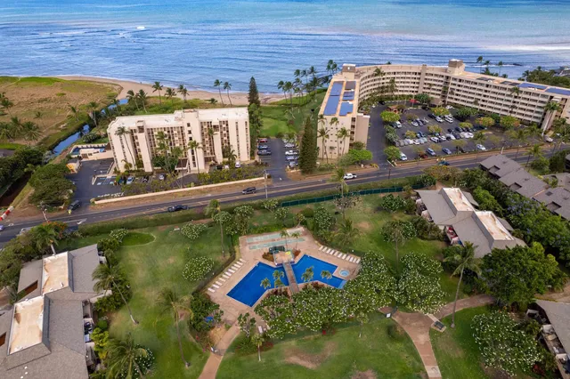 a view of a street with a building in the background