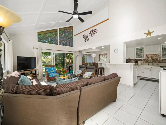 a kitchen with sink cabinets and window