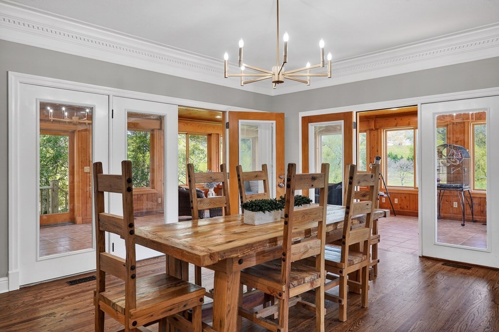 4671 Bunker Hill Road Cookeville, TN 38506 - Photo 18 of 87 a view of a dining room with furniture window and wooden floor