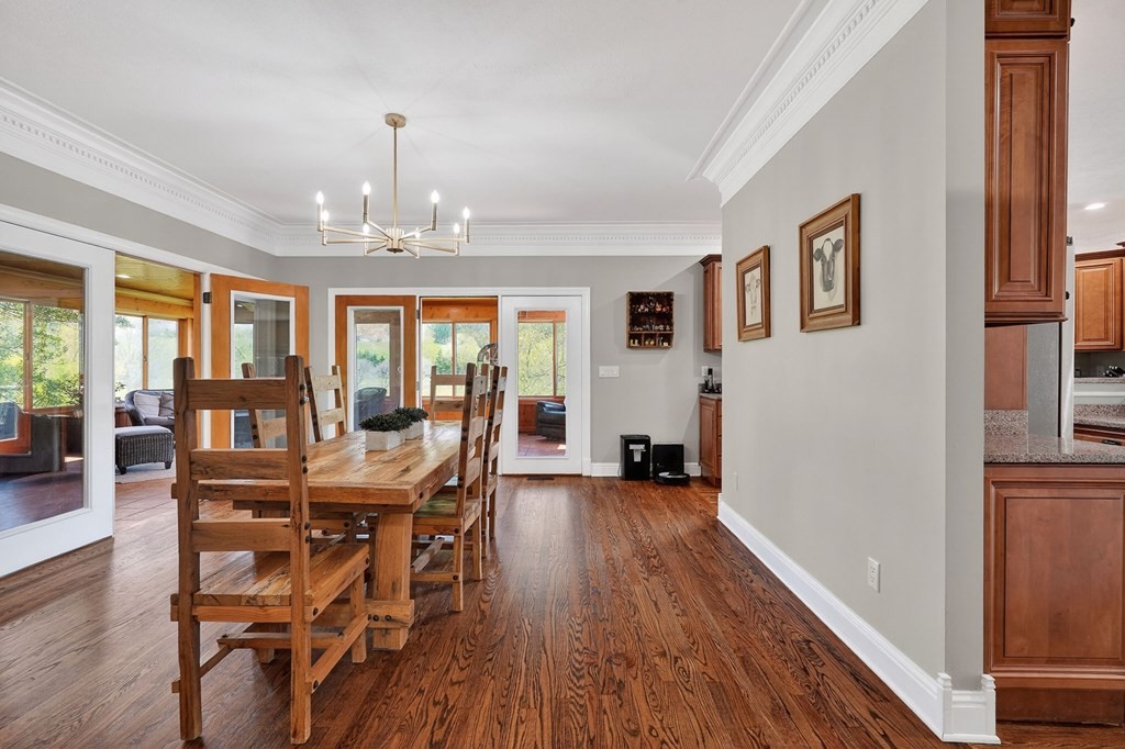 4671 Bunker Hill Road Cookeville, TN 38506 - Photo 19 of 87 a view of a dining room with furniture window and wooden floor