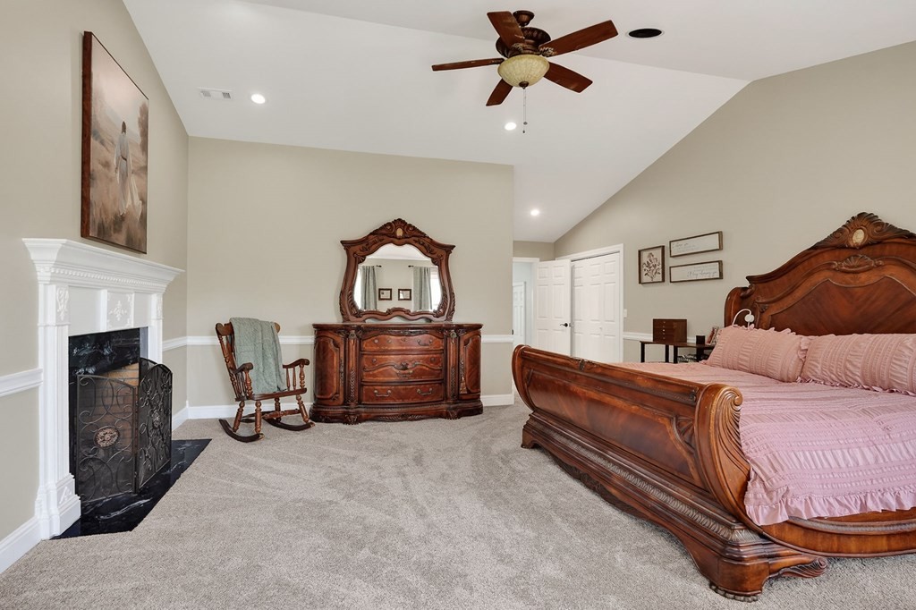 4671 Bunker Hill Road Cookeville, TN 38506 - Photo 26 of 87 a living room with furniture and a fireplace