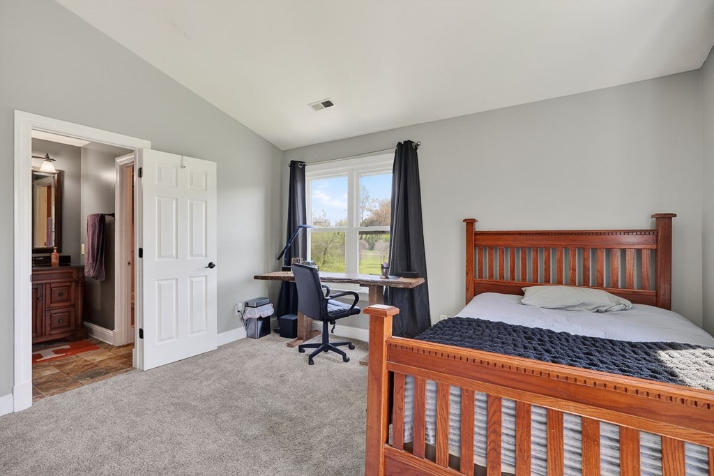 4671 Bunker Hill Road Cookeville, TN 38506 - Photo 40 of 87 a bedroom with a bed and a window