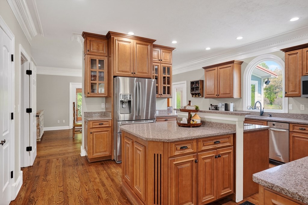 4671 Bunker Hill Road Cookeville, TN 38506 - Photo 10 of 87 a kitchen with stainless steel appliances granite countertop a refrigerator and a sink