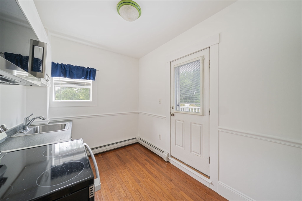 167 Middle Street Braintree, MA 02184 - Photo 13 of 30 a room with a wooden floor and a sink