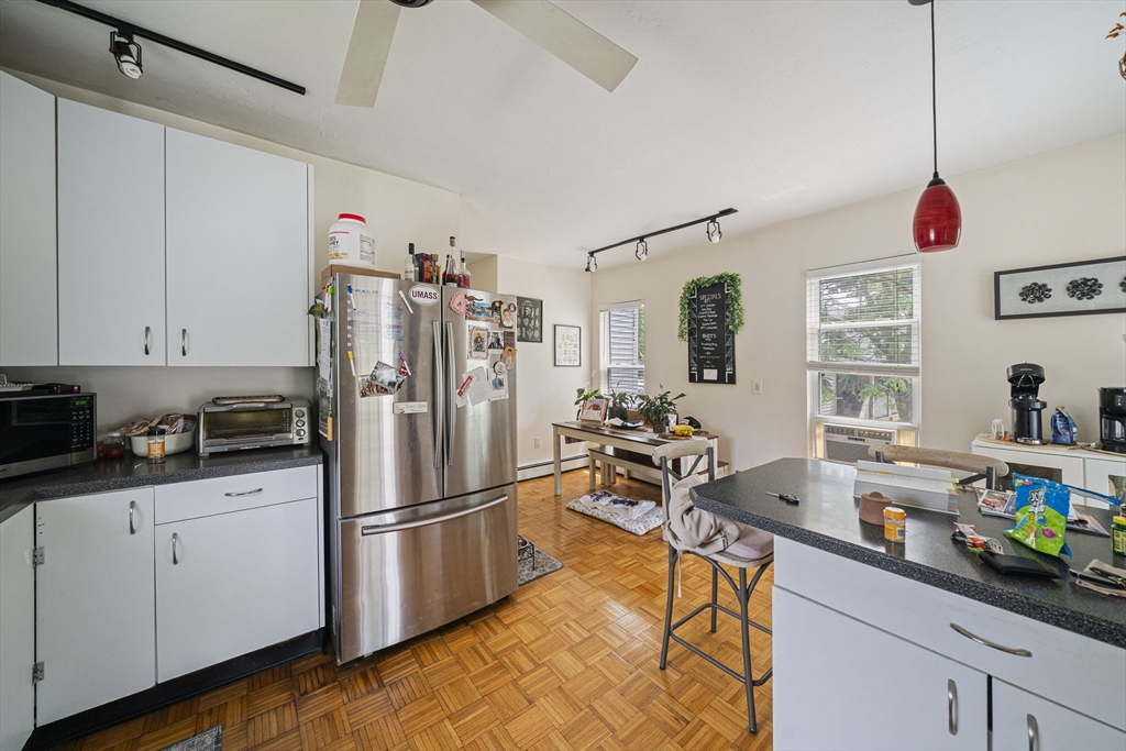 167 Middle Street Braintree, MA 02184 - Photo 3 of 30 a kitchen with stainless steel appliances a sink cabinets and a window