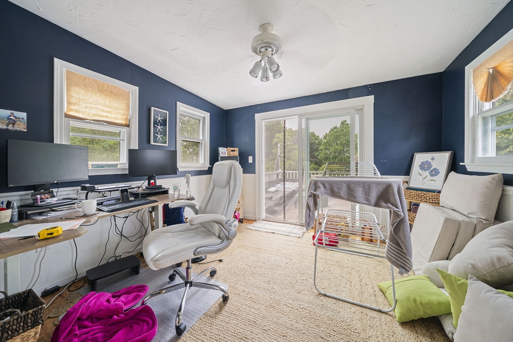 167 Middle Street Braintree, MA 02184 - Photo 10 of 30 a view of a livingroom with workspace and a window
