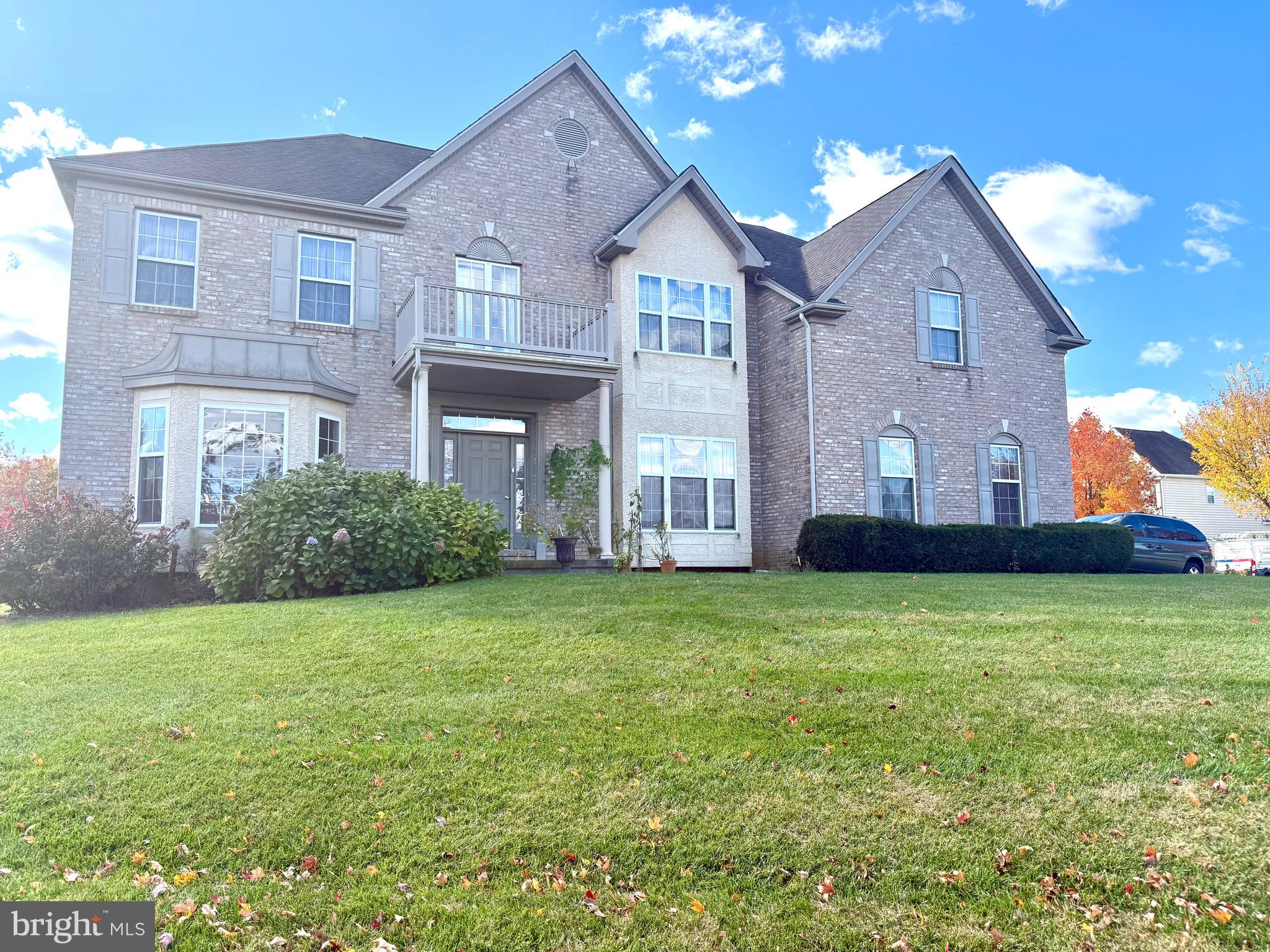 a house view with a garden space
