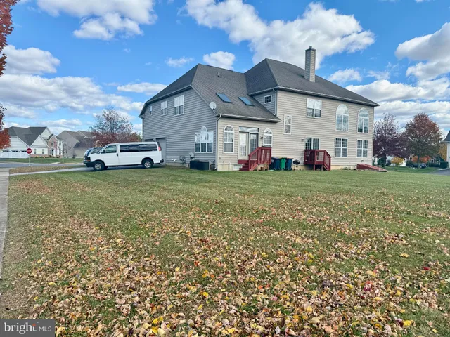 a car parked in front of a house