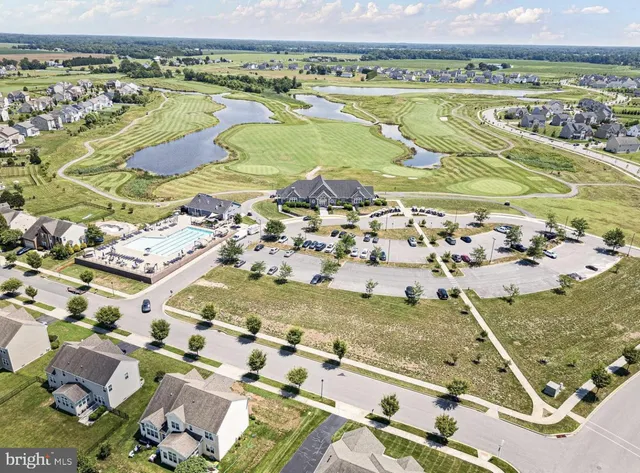 a view of a swimming pool and an ocean view