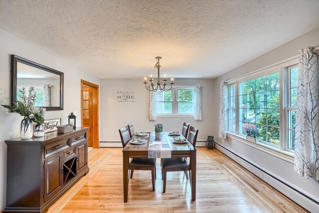 361 South Main Street Bellingham, MA 02019 - Photo 12 of 42 a view of a dining room with furniture window and wooden floor