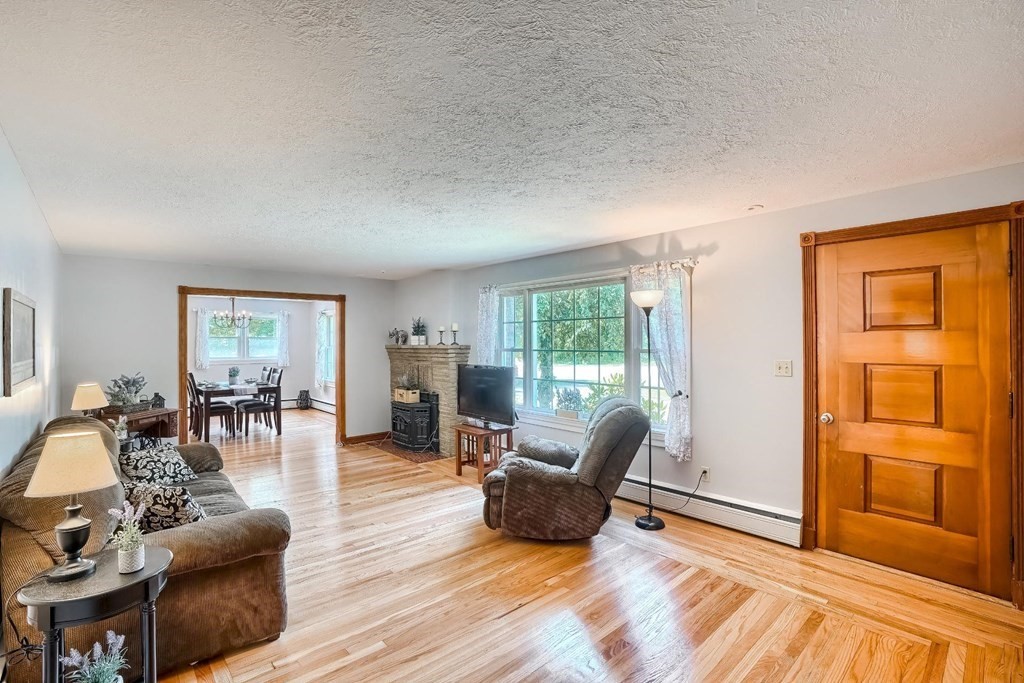 361 South Main Street Bellingham, MA 02019 - Photo 15 of 42 a living room with furniture and a window