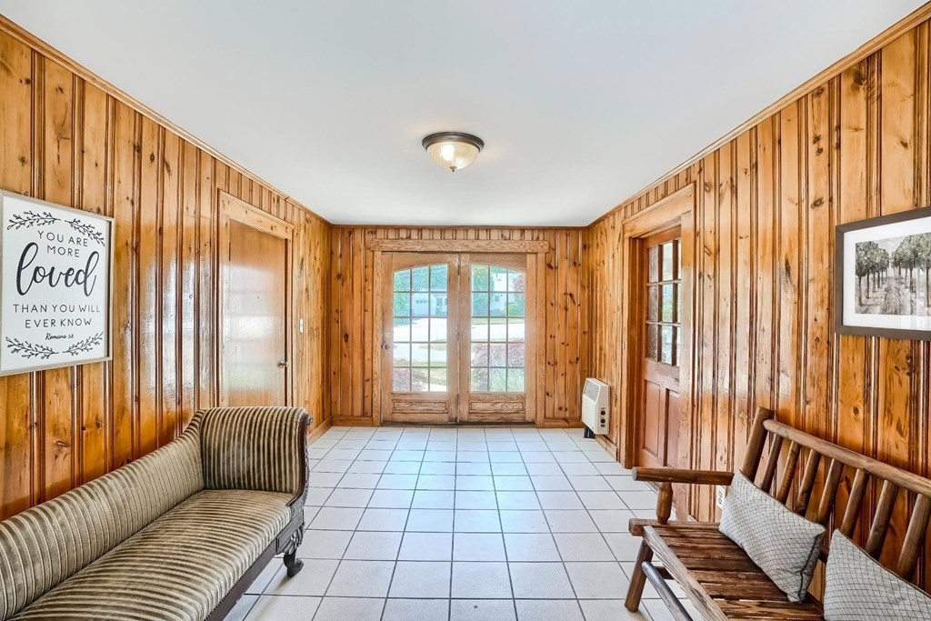 361 South Main Street Bellingham, MA 02019 - Photo 25 of 42 a living room with furniture and a window