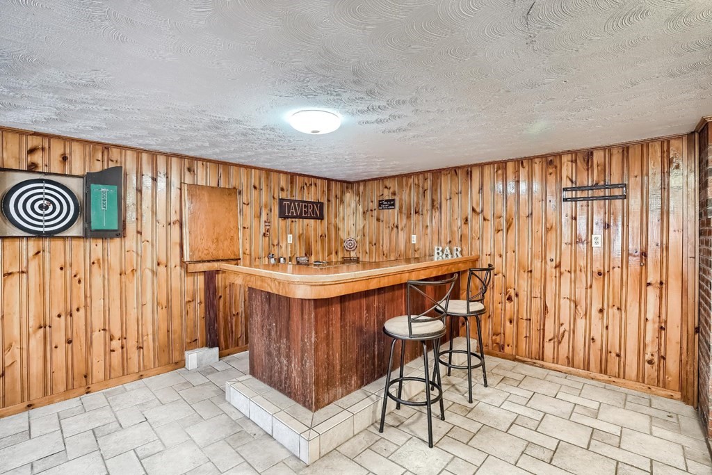 361 South Main Street Bellingham, MA 02019 - Photo 30 of 42 a bathroom with a sink a mirror and a shower