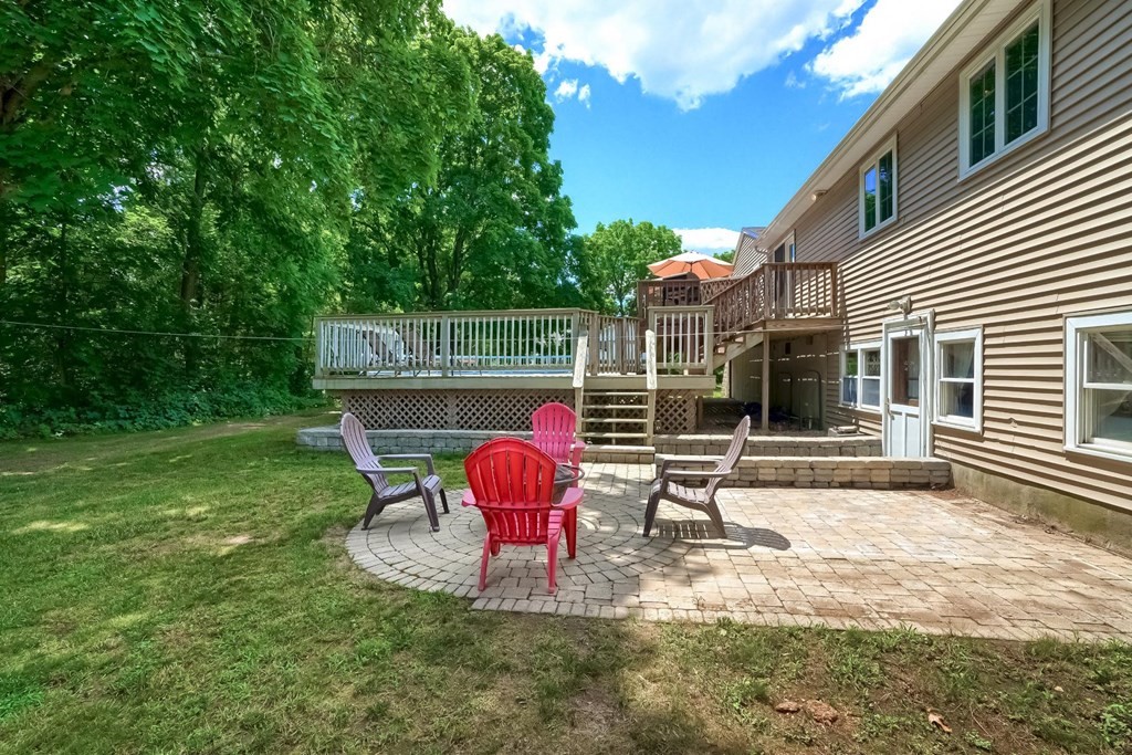361 South Main Street Bellingham, MA 02019 - Photo 35 of 42 a view of a chair and table in backyard of the house