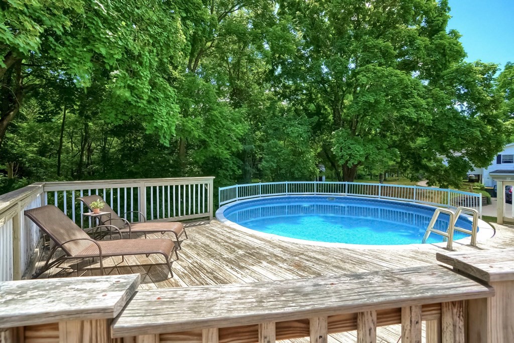 361 South Main Street Bellingham, MA 02019 - Photo 36 of 42 a view of a patio with a table & chairs